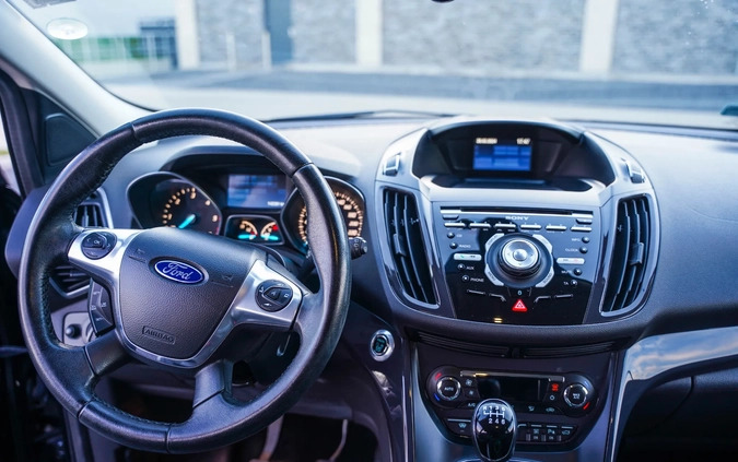 Ford Kuga cena 50000 przebieg: 143122, rok produkcji 2014 z Poznań małe 232